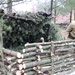 Building improvised shelters for Fort McCoy's Cold-Weather Operations Course