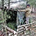 Building improvised shelters for Fort McCoy's Cold-Weather Operations Course