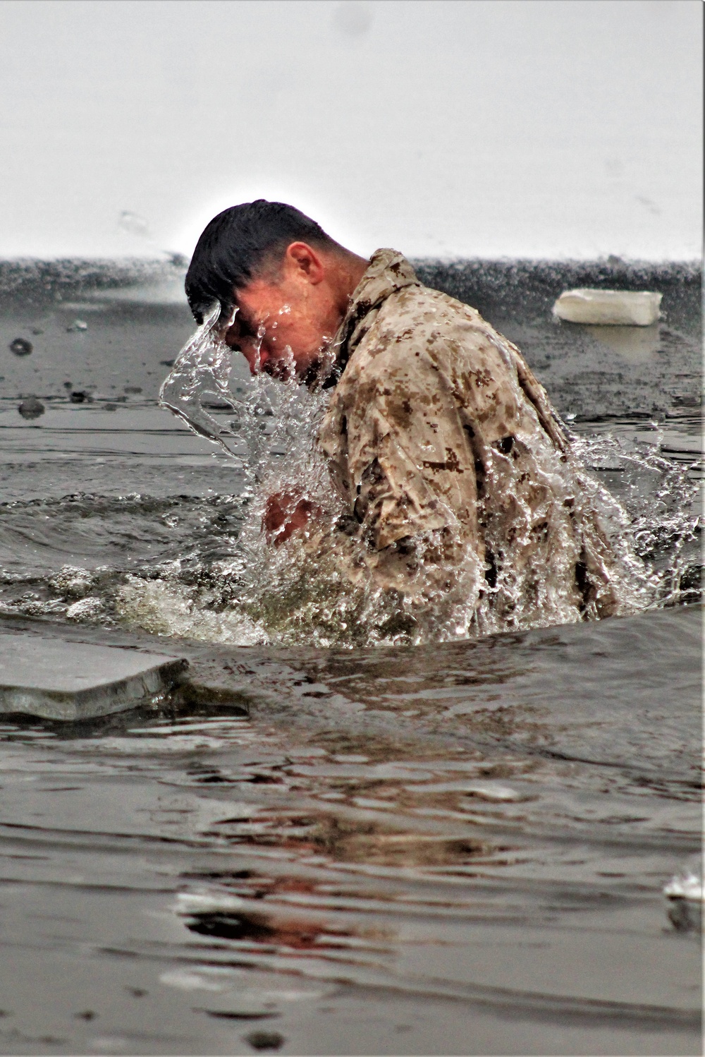 Marines jump in for cold-water immersion training at Fort McCoy