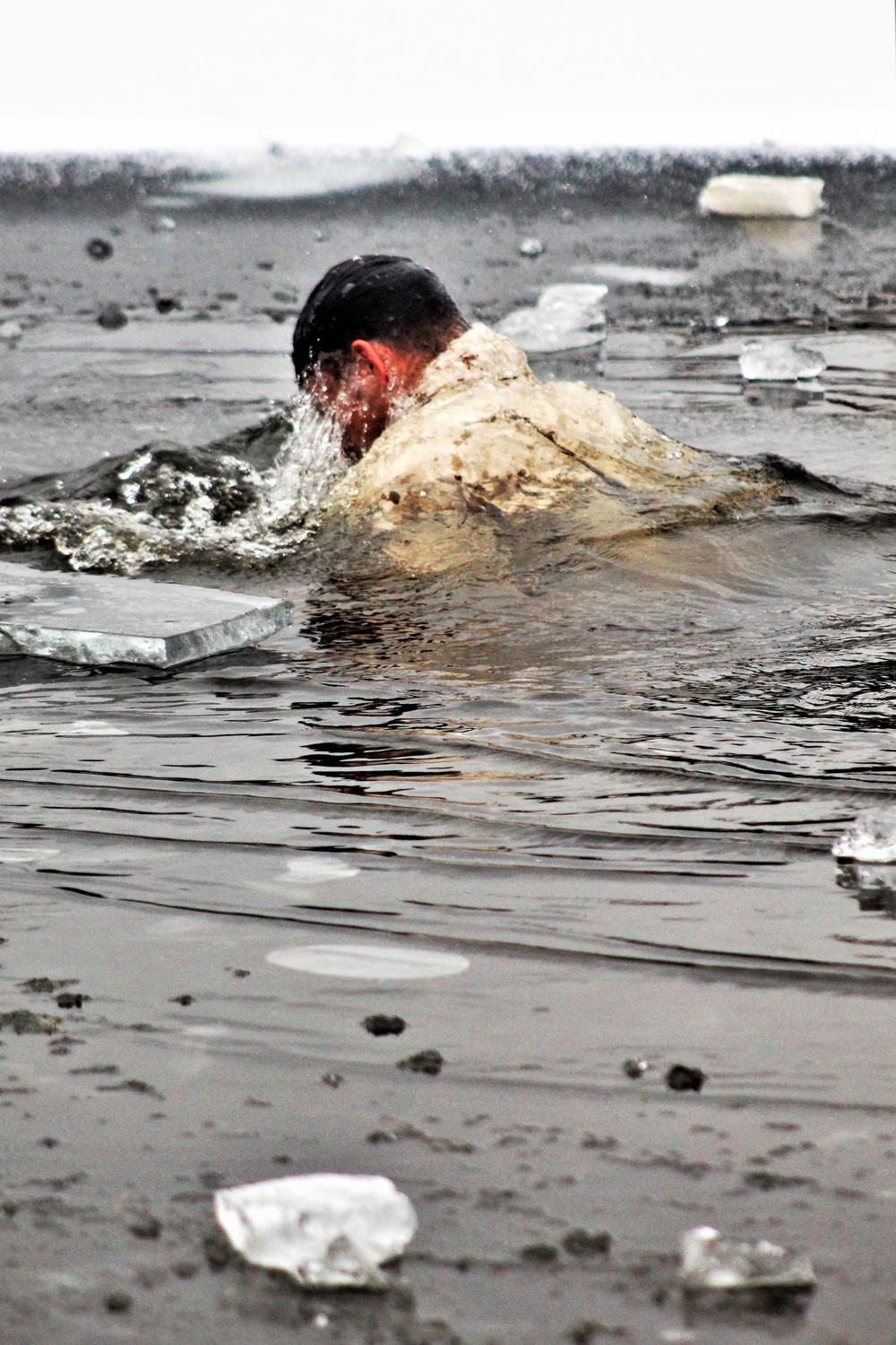 Marines jump in for cold-water immersion training at Fort McCoy