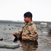 Marines jump in for cold-water immersion training at Fort McCoy