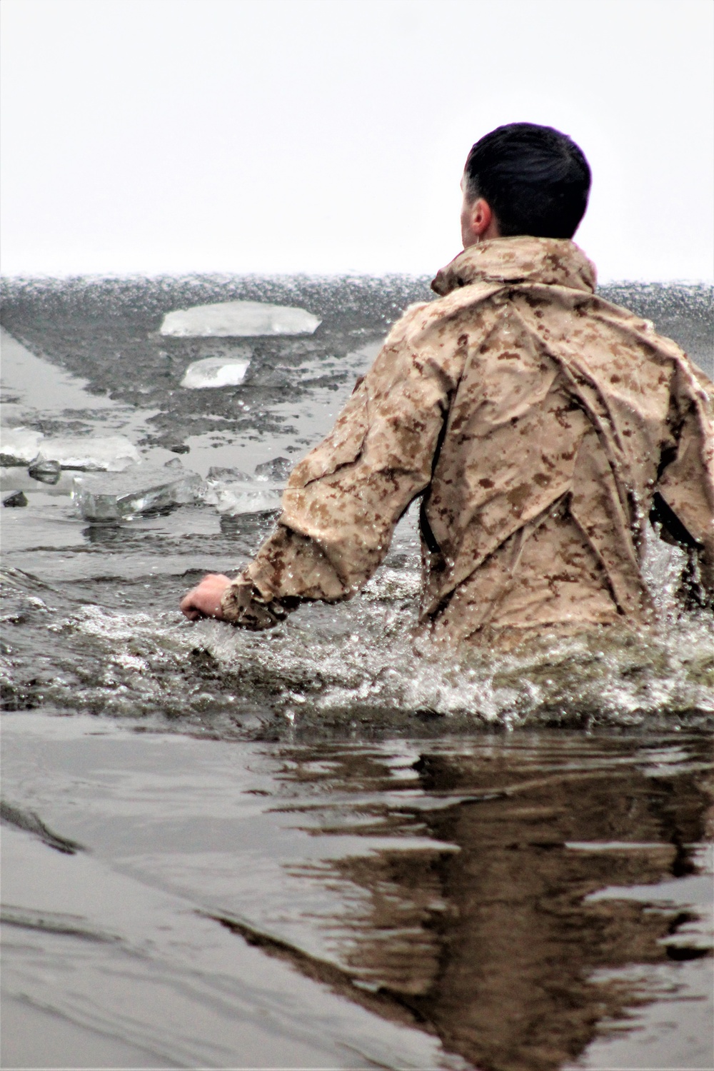 Marines jump in for cold-water immersion training at Fort McCoy