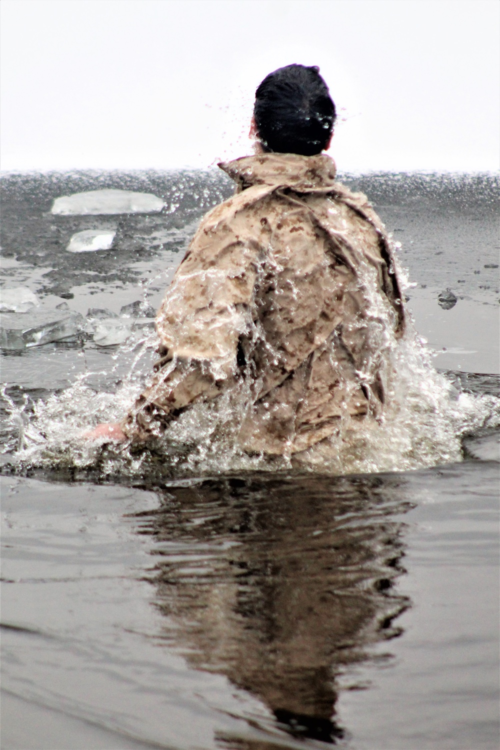 Marines jump in for cold-water immersion training at Fort McCoy