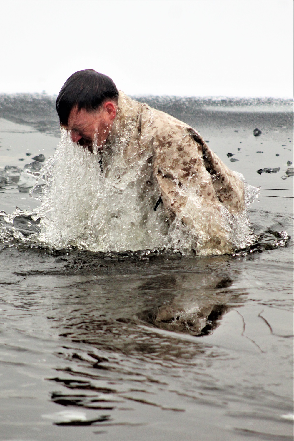 Marines jump in for cold-water immersion training at Fort McCoy