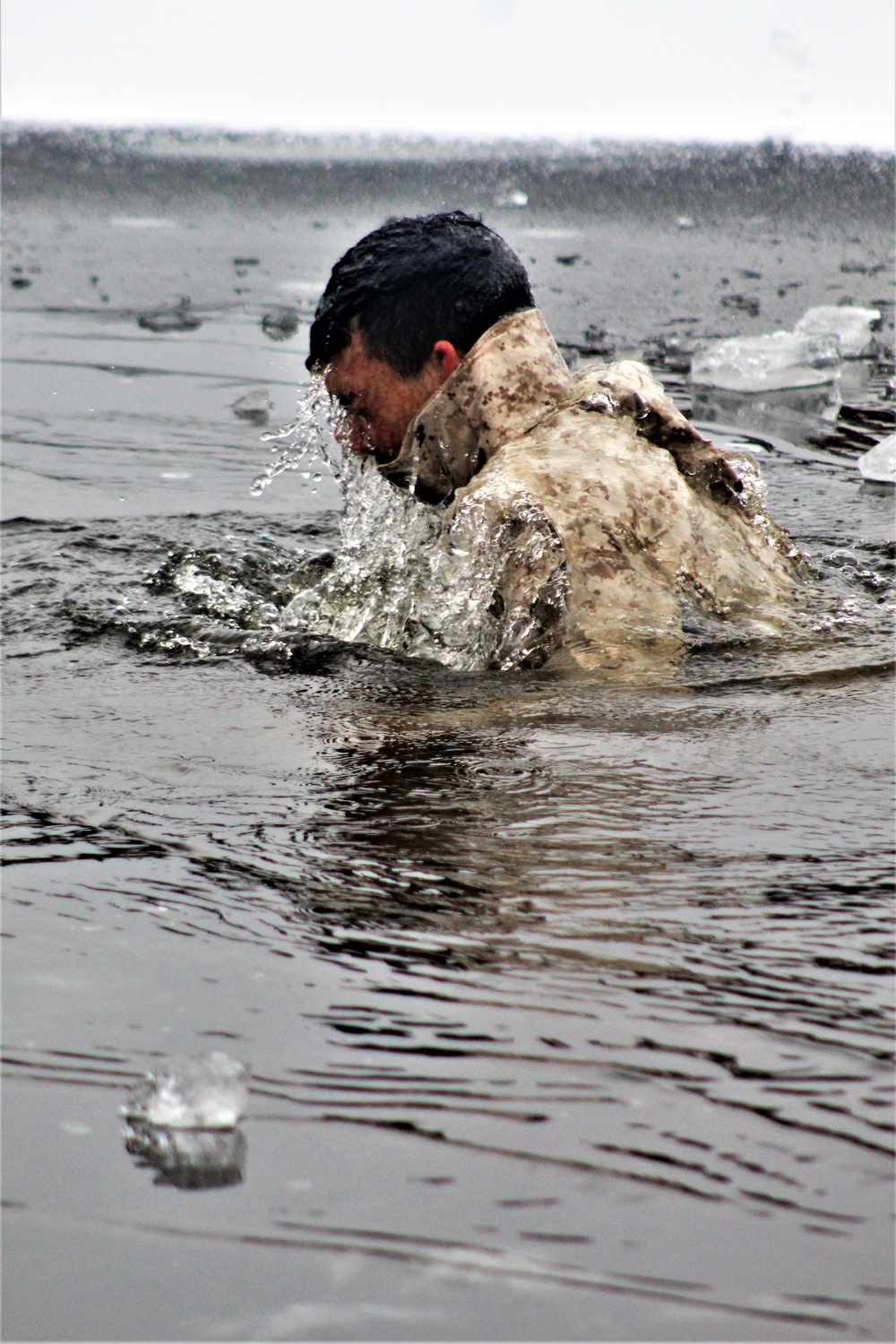 Marines jump in for cold-water immersion training at Fort McCoy