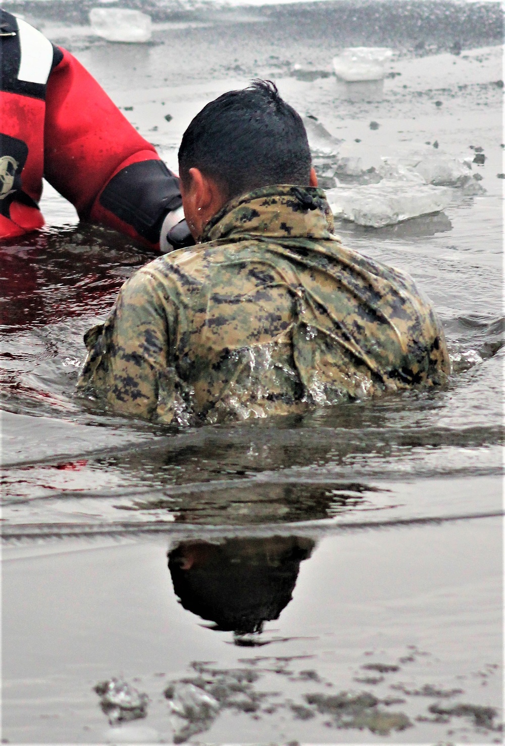 Marines jump in for cold-water immersion training at Fort McCoy