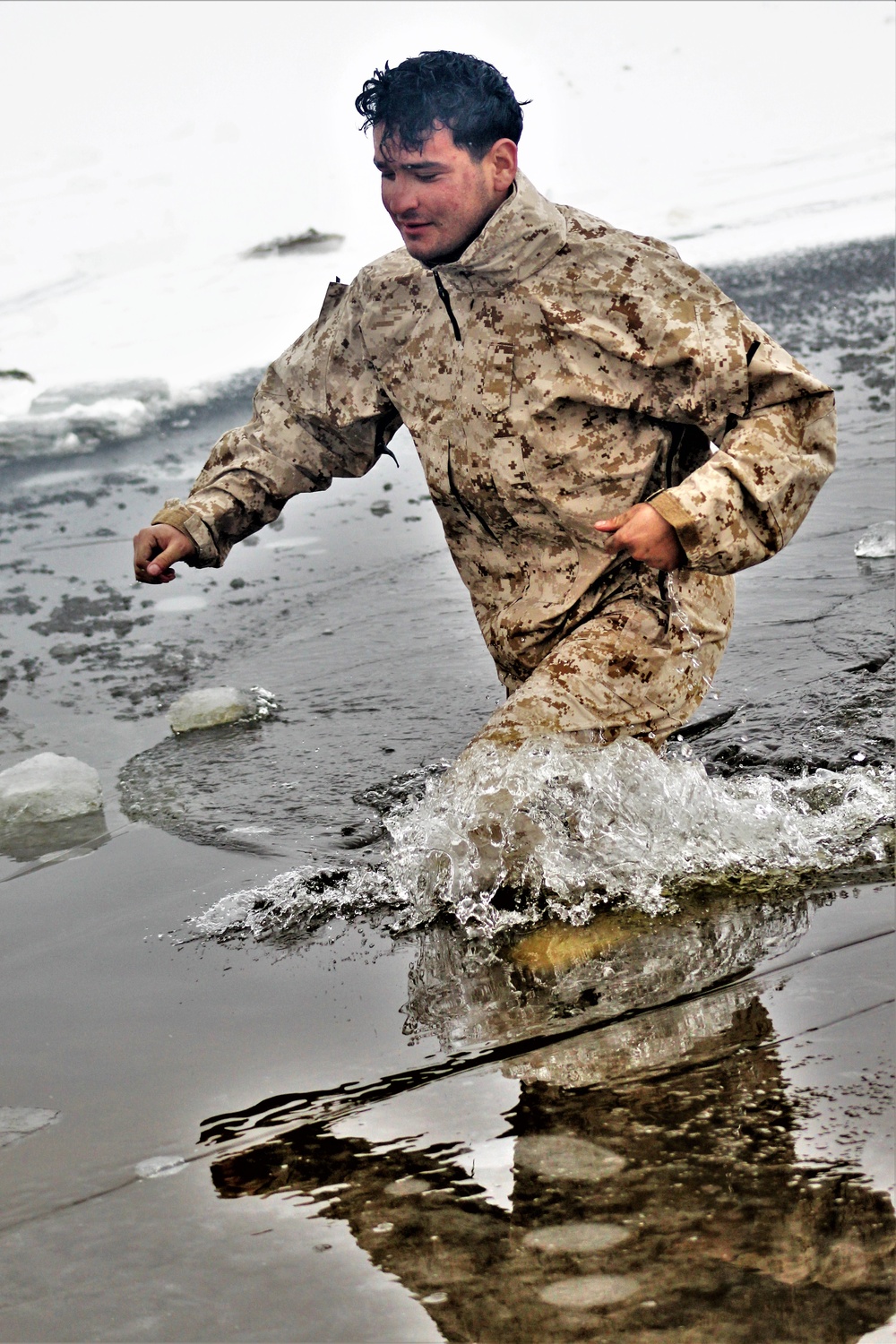 Marines jump in for cold-water immersion training at Fort McCoy