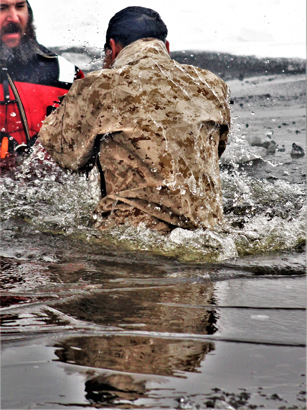 Marines jump in for cold-water immersion training at Fort McCoy