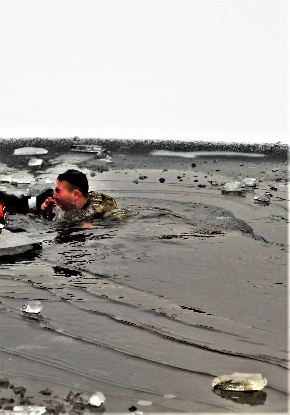 Marines jump in for cold-water immersion training at Fort McCoy