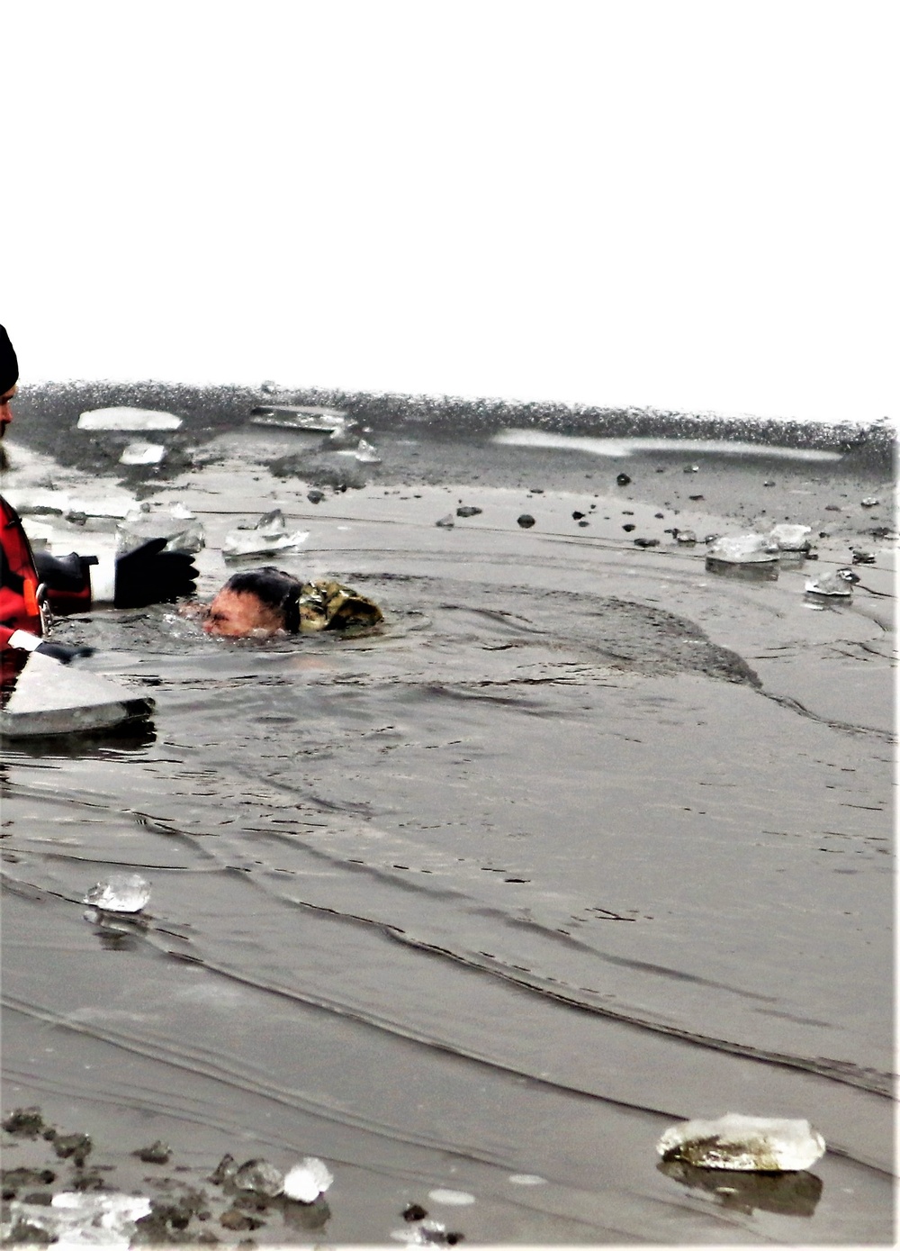 Marines jump in for cold-water immersion training at Fort McCoy