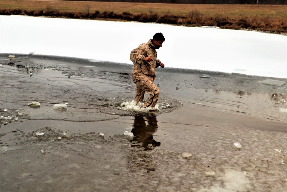 Marines jump in for cold-water immersion training at Fort McCoy