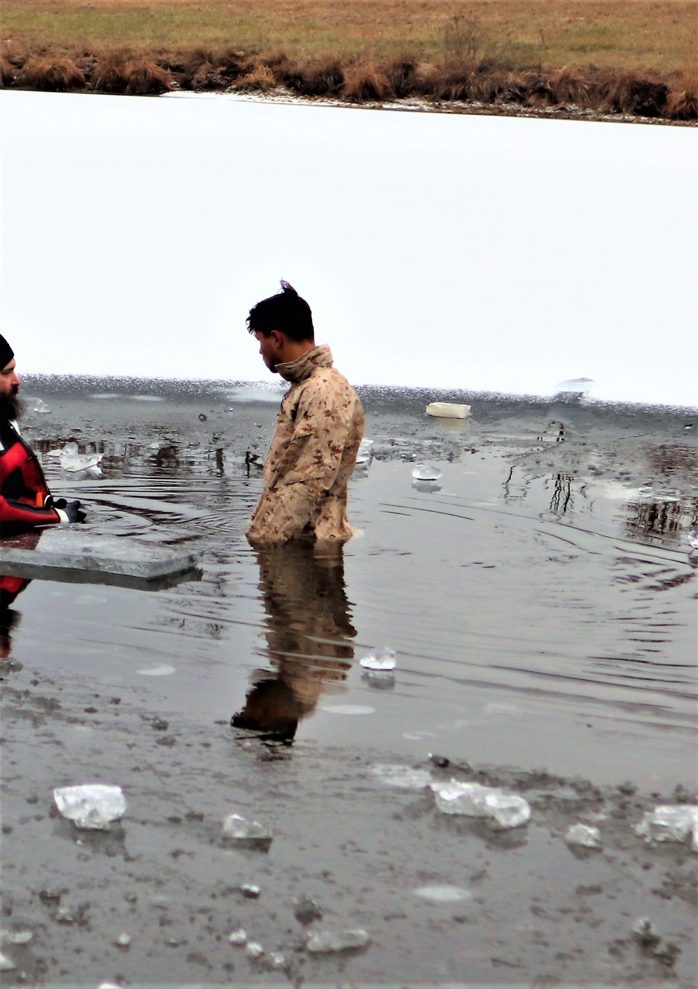 Marines jump in for cold-water immersion training at Fort McCoy