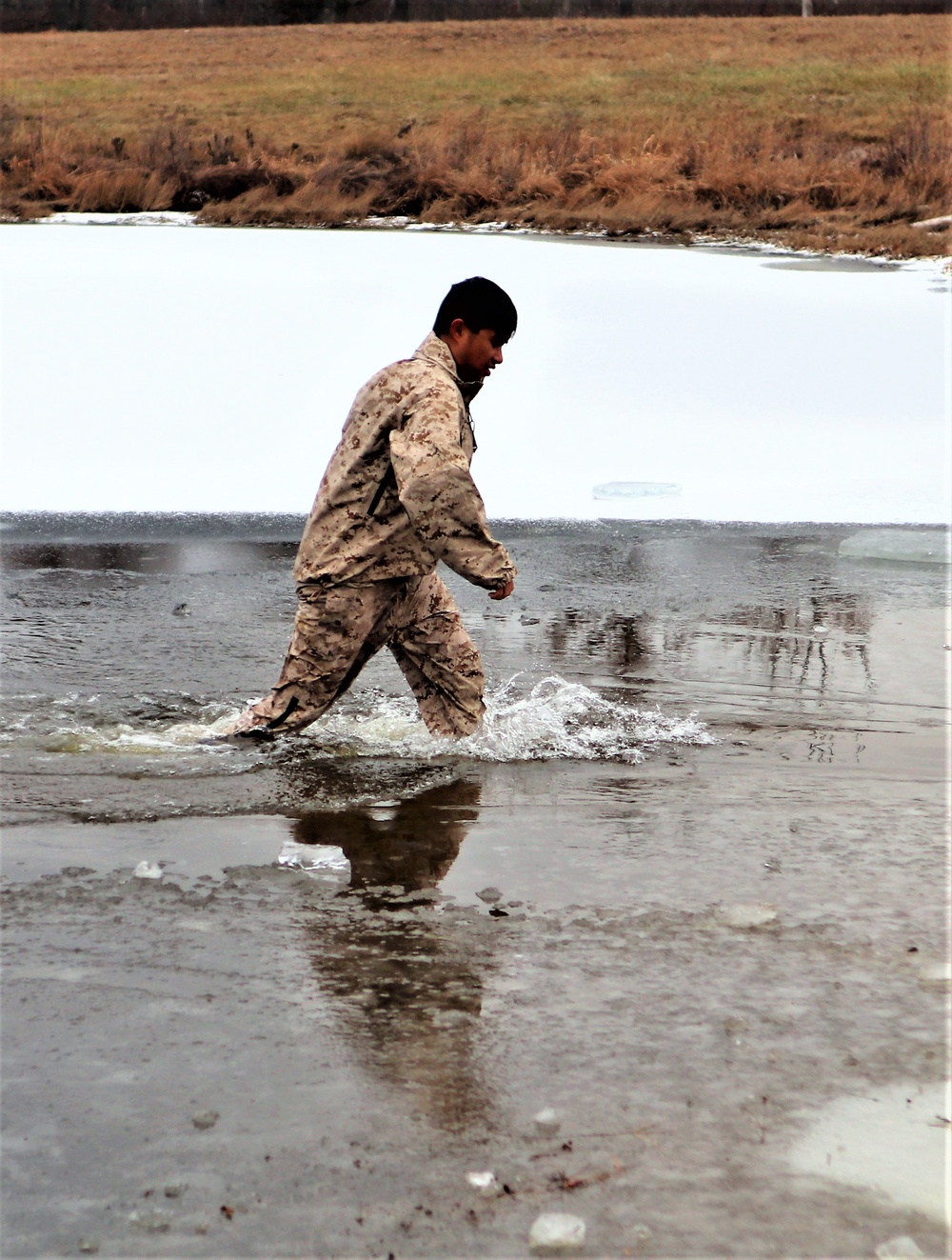 Marines jump in for cold-water immersion training at Fort McCoy