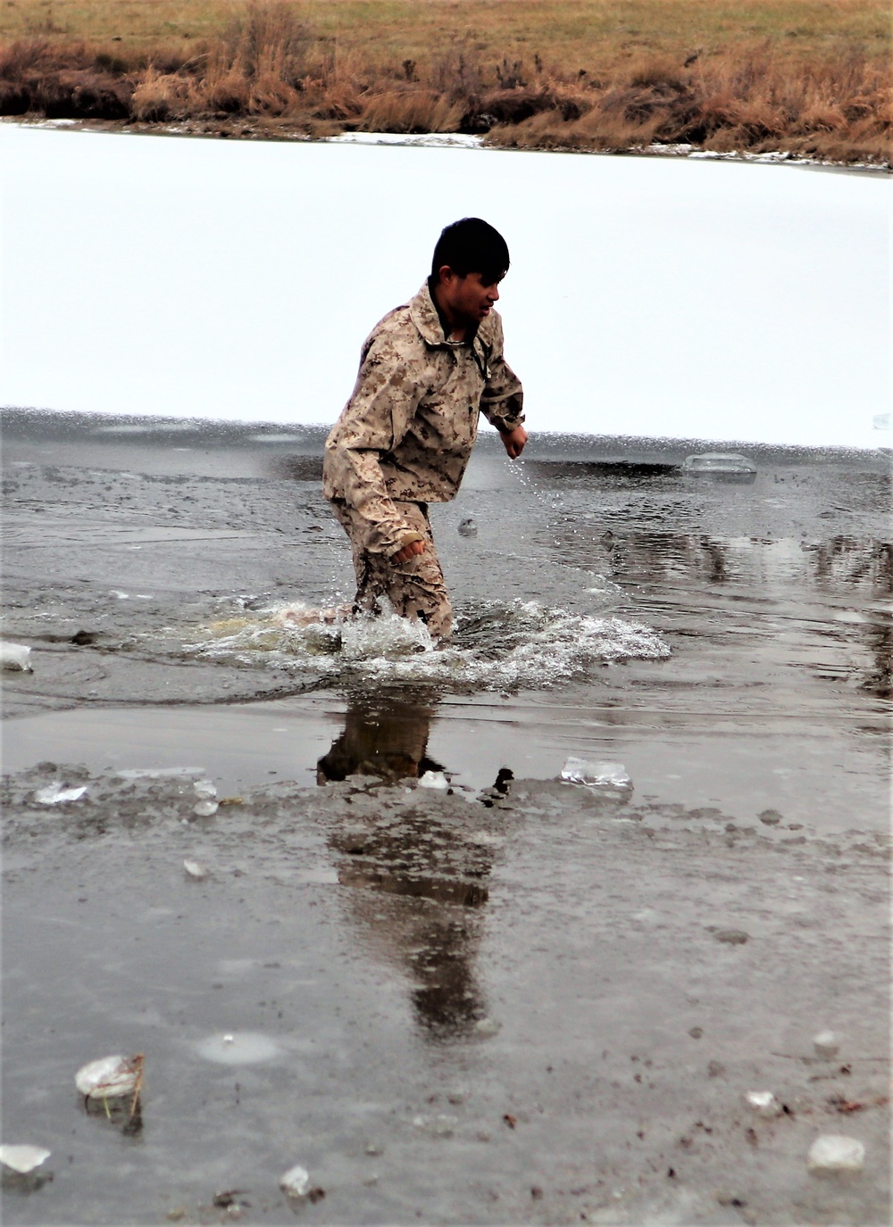 Marines jump in for cold-water immersion training at Fort McCoy