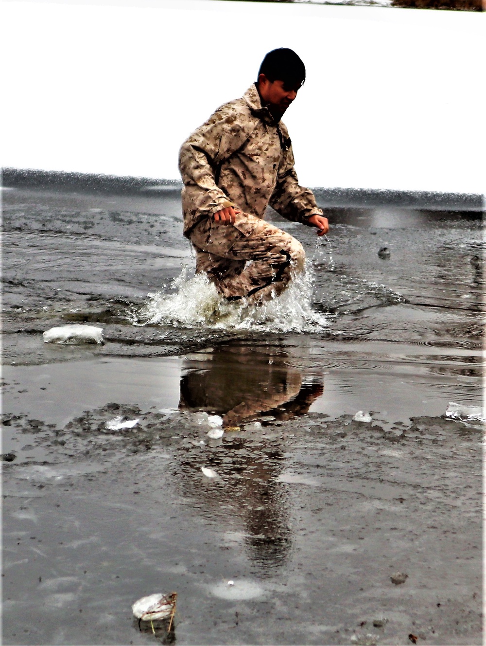 Marines jump in for cold-water immersion training at Fort McCoy