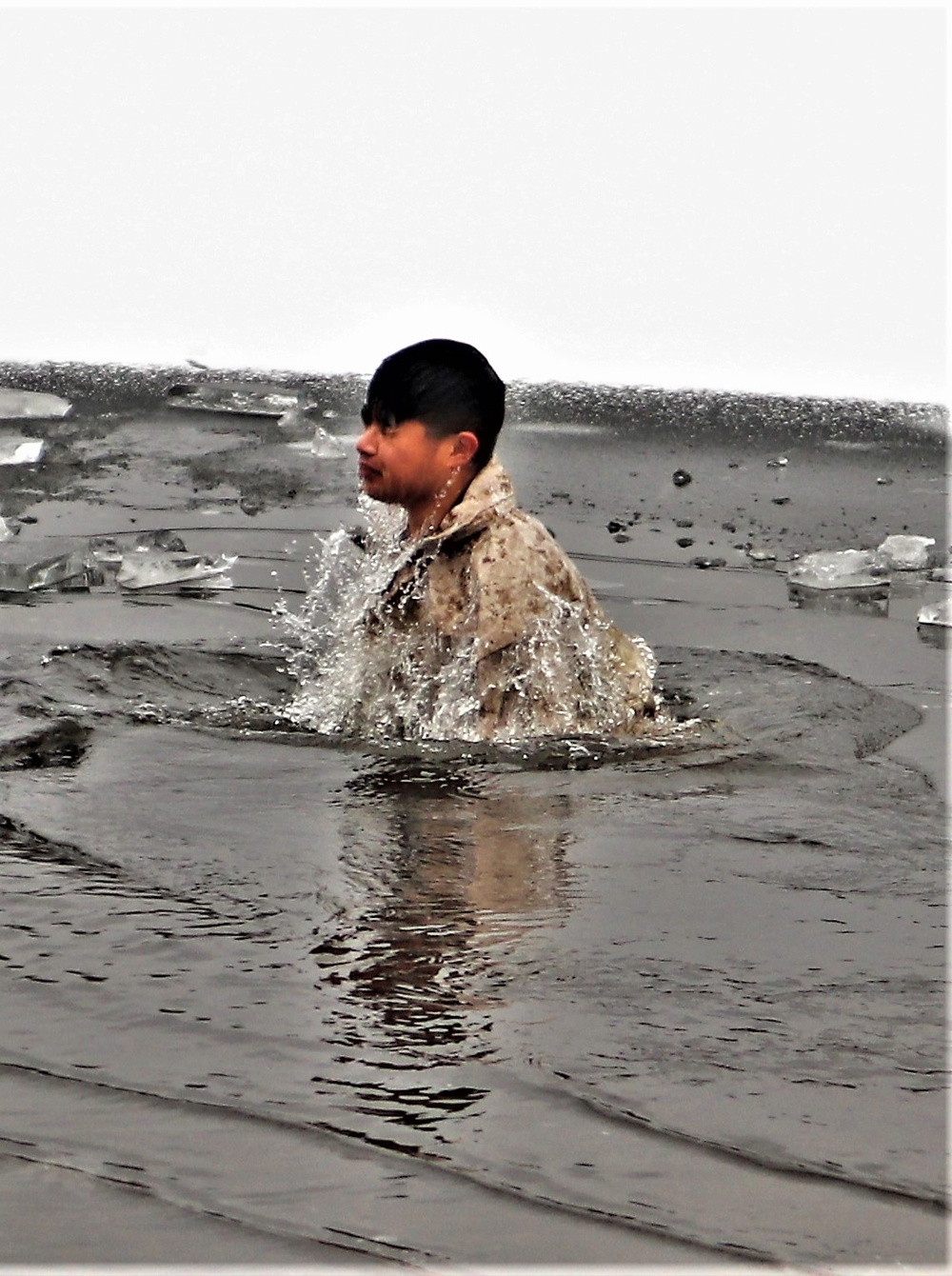 Marines jump in for cold-water immersion training at Fort McCoy