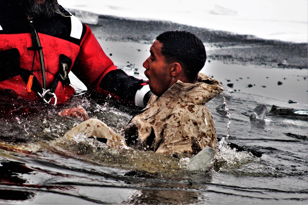 Marines jump in for cold-water immersion training at Fort McCoy