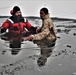 Marines jump in for cold-water immersion training at Fort McCoy