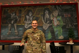 Chalkboard artist enhances morale of AES