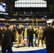 Indiana National Guardsmen support the Oath of Enlistment of future U.S. troops at Lucas Oil Stadium