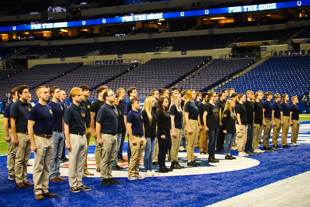 Indiana National Guardsmen support the Oath of Enlistment of future U.S. troops at Lucas Oil Stadium