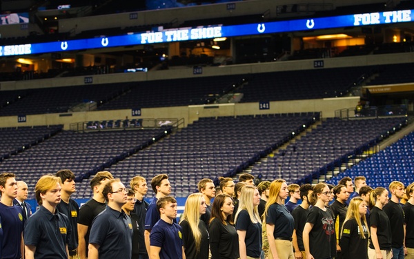 Indiana National Guardsmen support the Oath of Enlistment of future U.S. troops at Lucas Oil Stadium