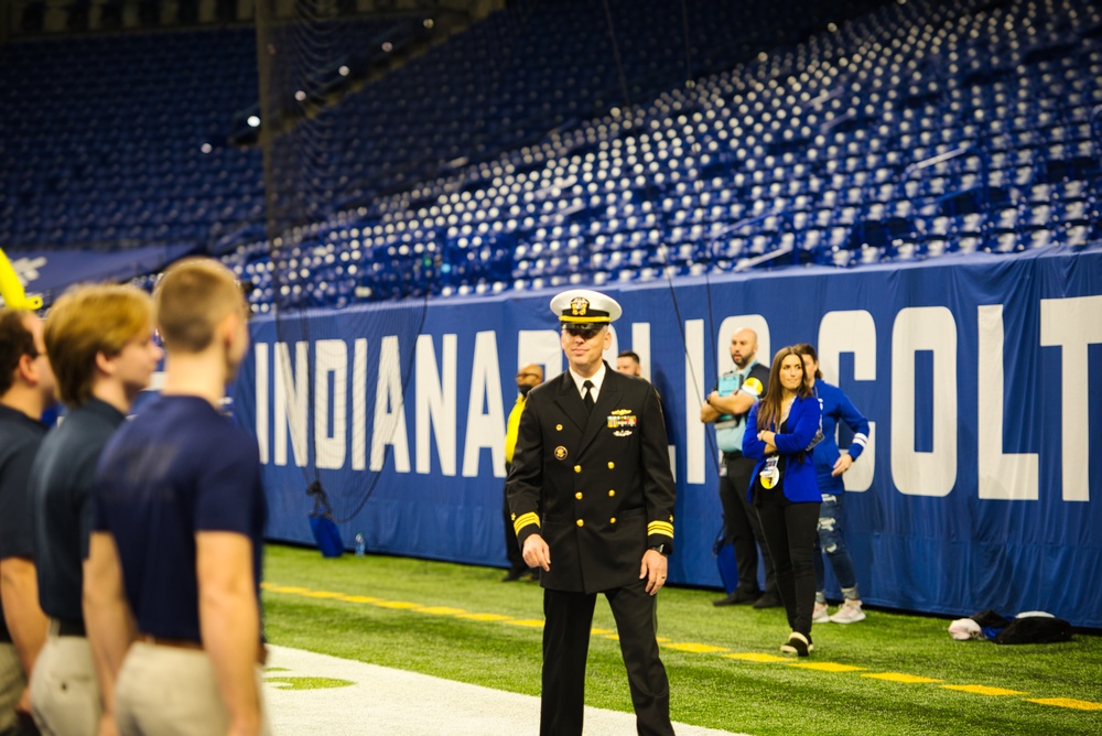 Indiana National Guardsmen support the Oath of Enlistment of future U.S. troops at Lucas Oil Stadium