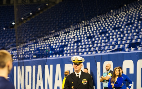 Indiana National Guardsmen support the Oath of Enlistment of future U.S. troops at Lucas Oil Stadium