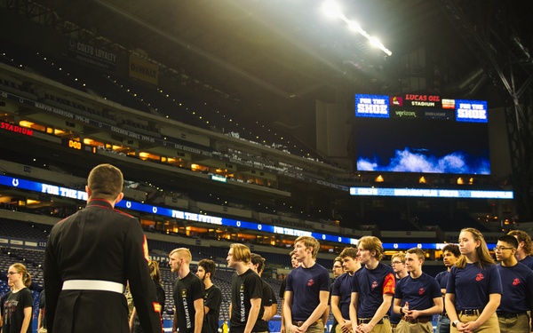 Indiana National Guardsmen support the Oath of Enlistment of future U.S. troops at Lucas Oil Stadium