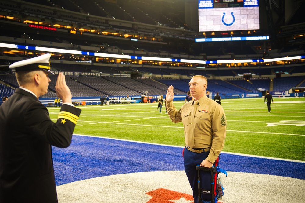 Indiana National Guardsmen support the Oath of Enlistment of future U.S. troops at Lucas Oil Stadium