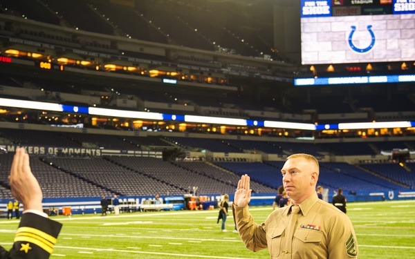 Indiana National Guardsmen support the Oath of Enlistment of future U.S. troops at Lucas Oil Stadium