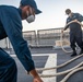 USS Milwaukee Sailors Fake Out Lines on the Flight Deck