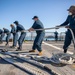 USS Milwaukee Sailors Heave Line on the Flight Deck