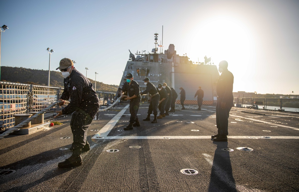 USS Milwaukee Sailors Heave Line on the Flight Deck as the Ship Departs