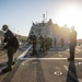 USS Milwaukee Sailors Heave Line on the Flight Deck as the Ship Departs