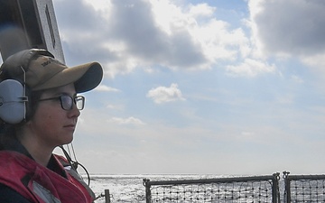 USS Chafee (DDG 90) Sailor Stands Watch In South China Sea