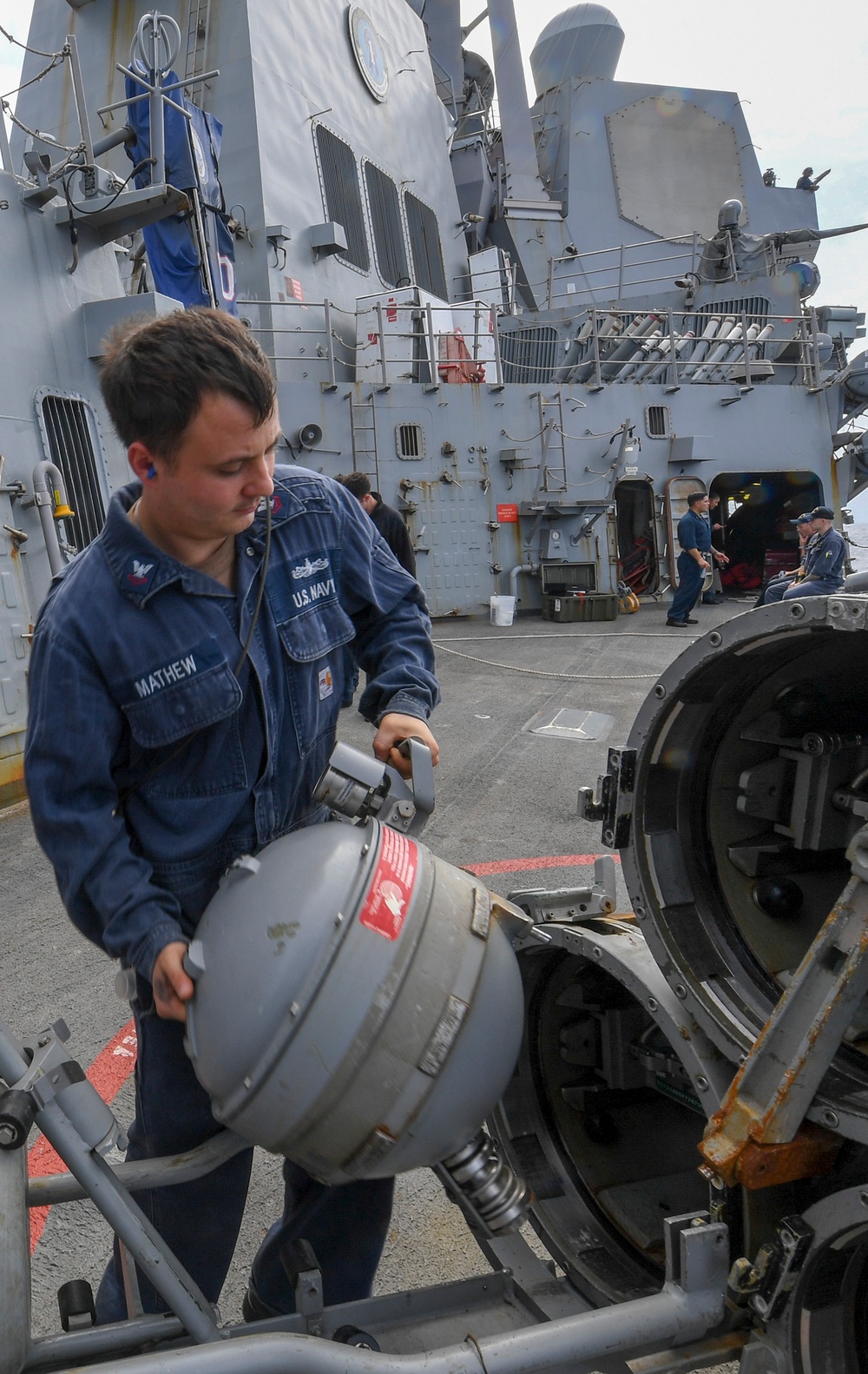 USS Chafee (DDG 90) Sailors Conduct Torpedo Maintenance