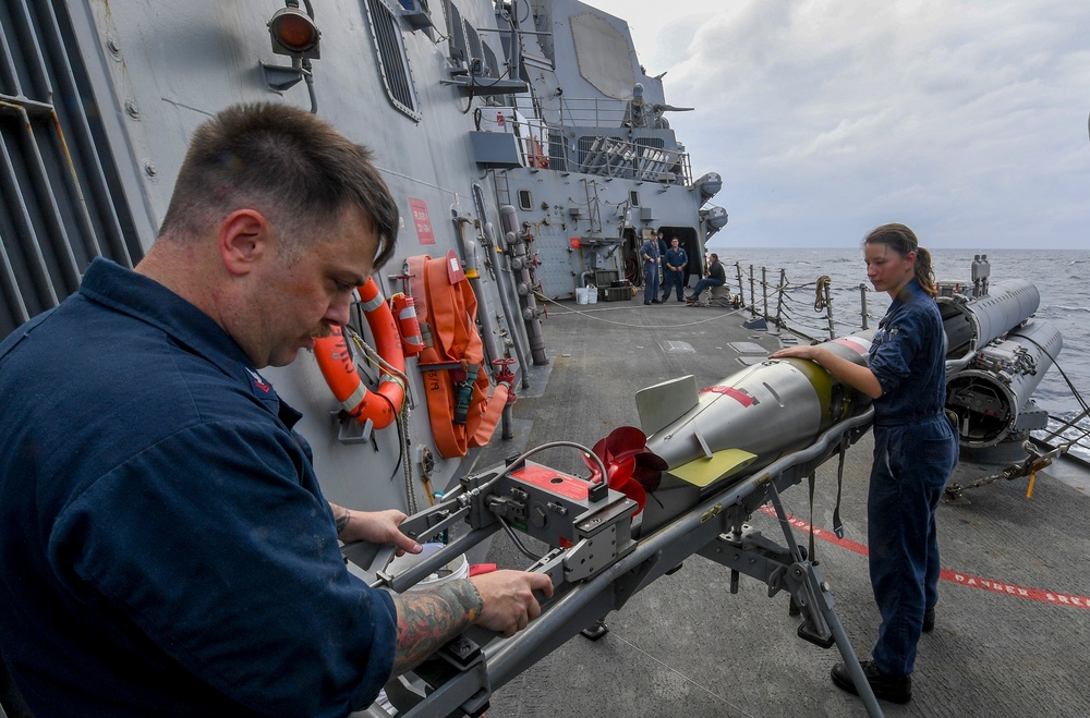 USS Chafee (DDG 90) Sailors Conduct Torpedo Maintenance