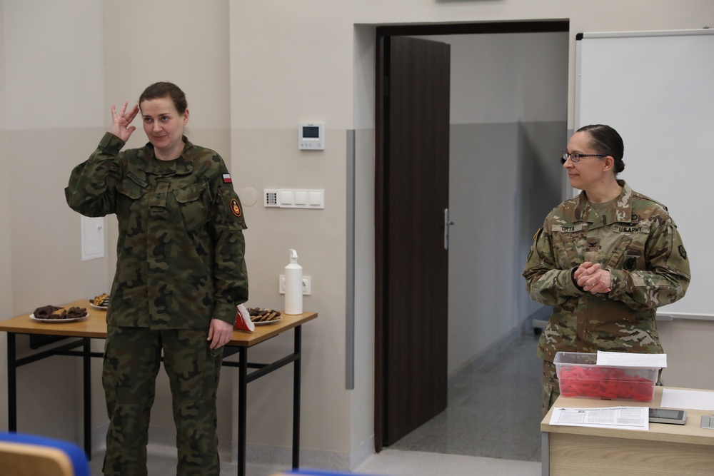 Women of the U.S. and Polish Armed Forces come together for a Women's Cultural Exchange