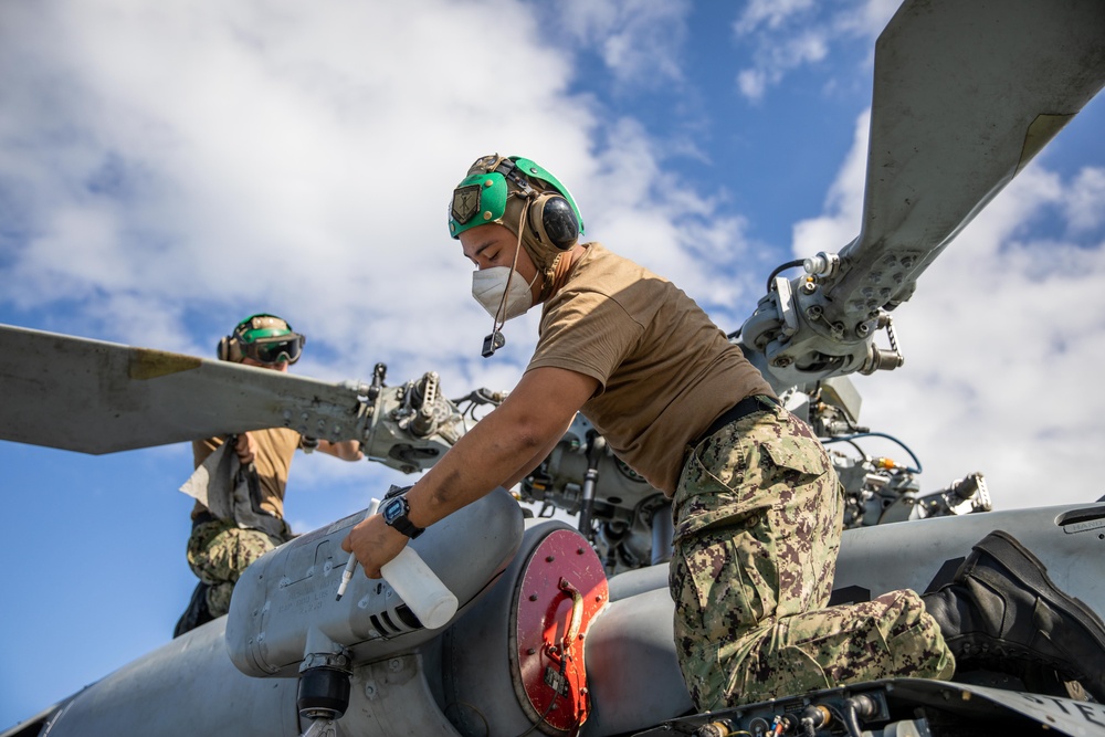 USS Milwaukee and HSC 22 Sailors Maintain Readiness