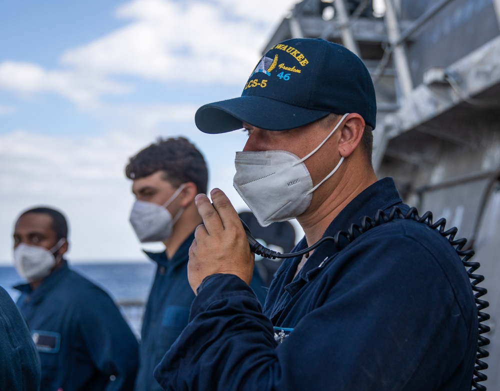 USS Milwaukee Sailor Communicates with the Helicopter Control Tower