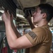 USS Carl Vinson (CVN 70) Sailor cleans