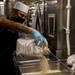 Abraham Lincoln Sailors serve food