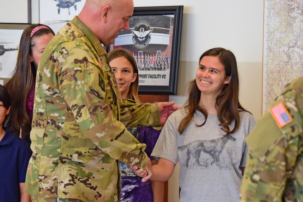 Bear attack victim visits Army National Guard crew who rescued her