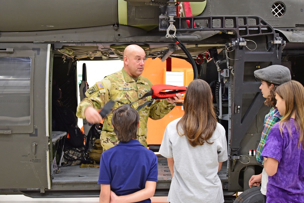 Bear attack victim visits Army National Guard crew who rescued her