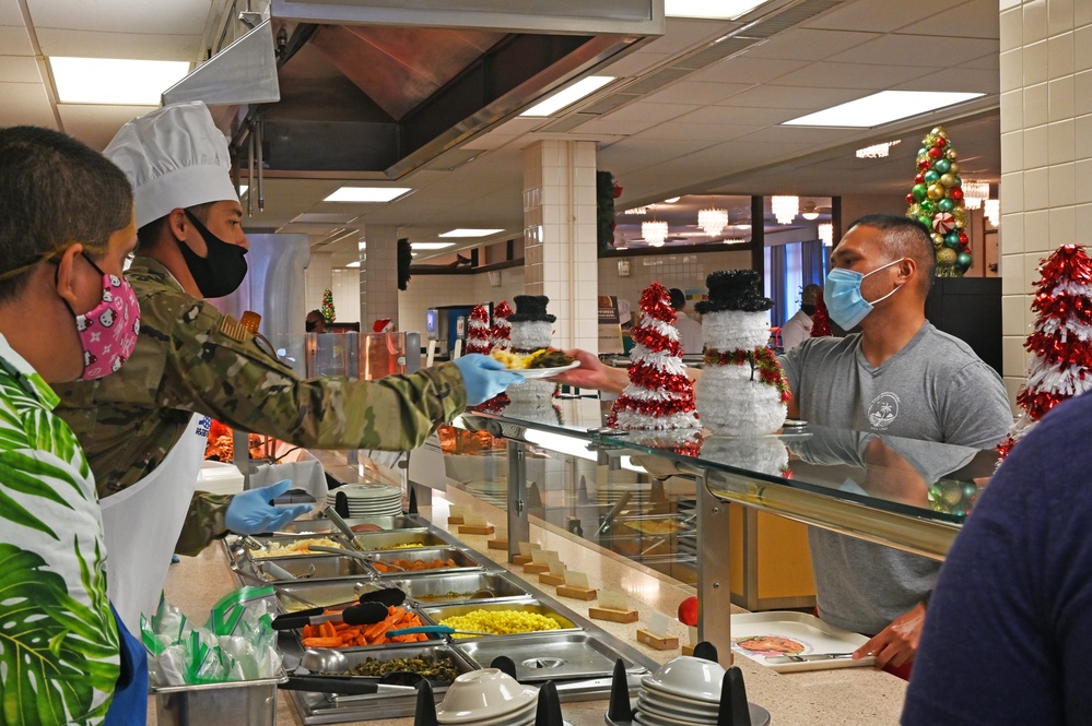 15th Wing Leadership serves Christmas eve lunch