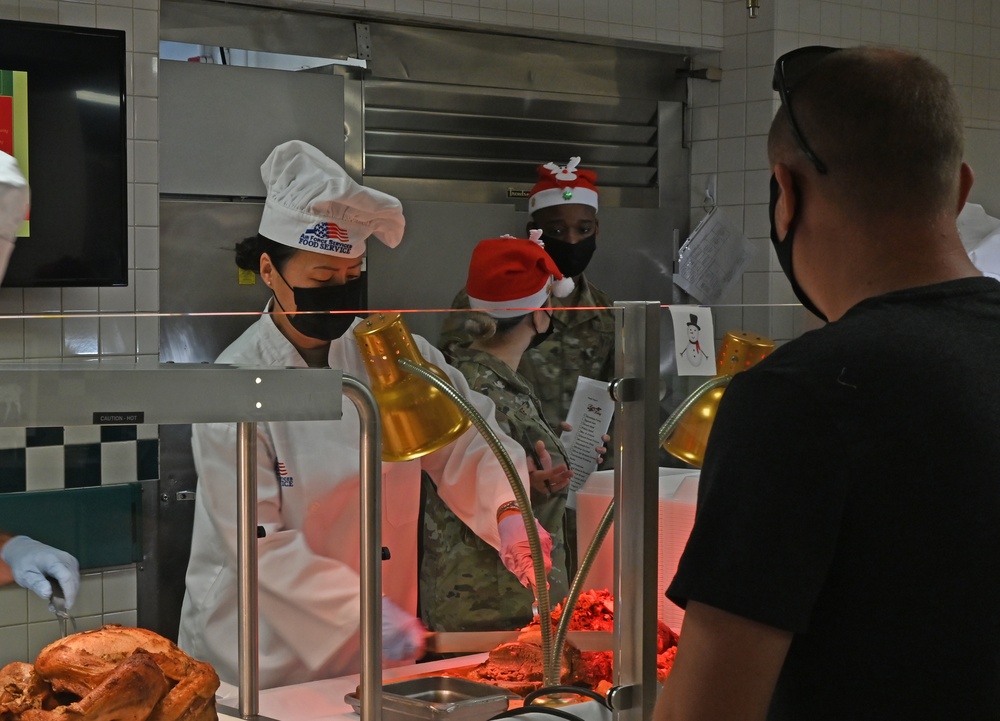 15th Wing Leadership serves Christmas eve lunch