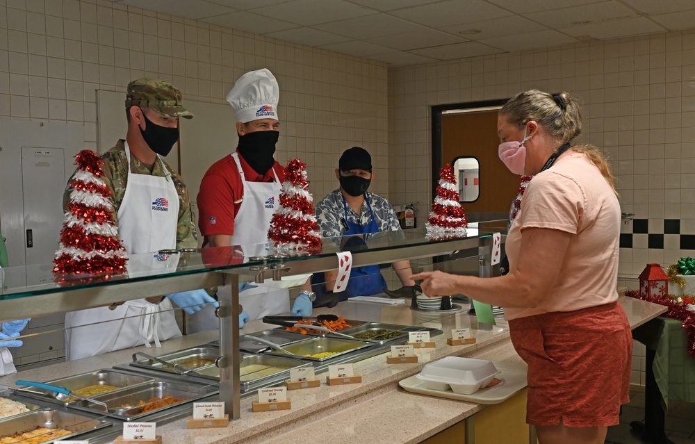 15th Wing Leadership serves Christmas eve lunch