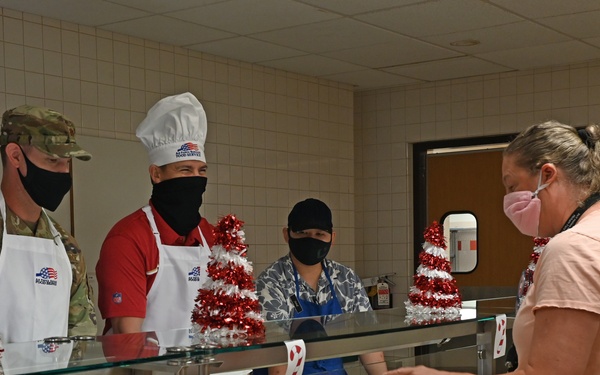 15th Wing Leadership serves Christmas eve lunch