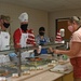 15th Wing Leadership serves Christmas eve lunch